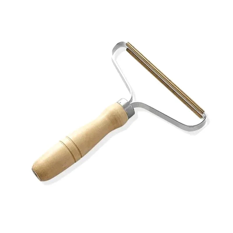 Kompakter Fusselentferner für Kleidung und Textilien